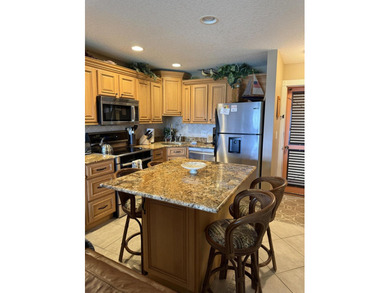 Completely refurbished top floor ocean view 1/1 at Villas III on Ocean Village Golf Course in Florida - for sale on GolfHomes.com, golf home, golf lot