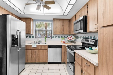 Step into comfort and convenience in this beautifully maintained on Hibiscus Golf Club in Florida - for sale on GolfHomes.com, golf home, golf lot