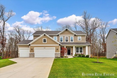 This Oak Harbor Preserve home is a treasure! Boasting 4 bedrooms on The Golf Club At Thornapple Pointe in Michigan - for sale on GolfHomes.com, golf home, golf lot