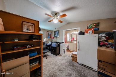 This charming 2-bedroom, 2-bath home is located in the highly on Paradise Peak Golf Course in Arizona - for sale on GolfHomes.com, golf home, golf lot