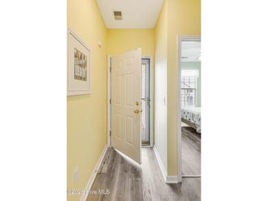 Welcome to easy coastal living in the sought-after community of on Sandpiper Bay Golf and Country Club in North Carolina - for sale on GolfHomes.com, golf home, golf lot