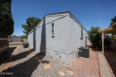 This charming 2-bedroom, 2-bath home is located in the highly on Paradise Peak Golf Course in Arizona - for sale on GolfHomes.com, golf home, golf lot