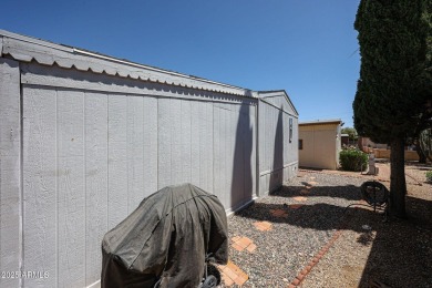 This charming 2-bedroom, 2-bath home is located in the highly on Paradise Peak Golf Course in Arizona - for sale on GolfHomes.com, golf home, golf lot