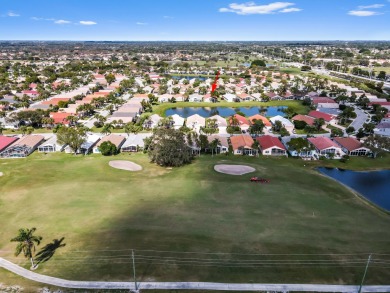 Welcome to this stunning lake-view home in the serene community on Westchester Golf and Country Club in Florida - for sale on GolfHomes.com, golf home, golf lot