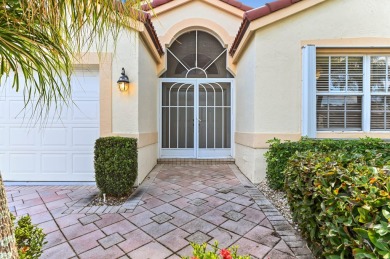 Welcome to this stunning lake-view home in the serene community on Westchester Golf and Country Club in Florida - for sale on GolfHomes.com, golf home, golf lot