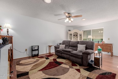 Welcome to this inviting Sun City home offering comfort on Sun City Lakes West and East in Arizona - for sale on GolfHomes.com, golf home, golf lot