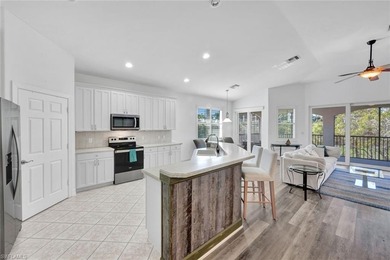 Gracefully positioned on the second floor with sweeping on Hammock Bay in Florida - for sale on GolfHomes.com, golf home, golf lot