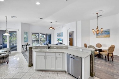 Gracefully positioned on the second floor with sweeping on Hammock Bay in Florida - for sale on GolfHomes.com, golf home, golf lot