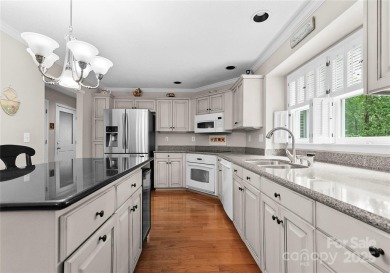 Nestled on a quiet cul-de-sac  backing up to the scenic Raintree on Raintree Country Club in North Carolina - for sale on GolfHomes.com, golf home, golf lot