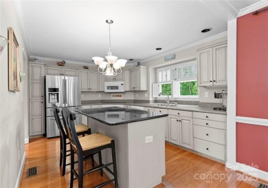 Nestled on a quiet cul-de-sac  backing up to the scenic Raintree on Raintree Country Club in North Carolina - for sale on GolfHomes.com, golf home, golf lot