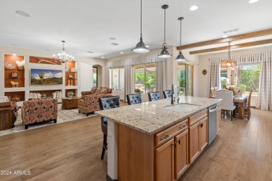 A stunning FURNISHED Voyage floor plan, where elegance & comfort on Copper Canyon Golf Club in Arizona - for sale on GolfHomes.com, golf home, golf lot