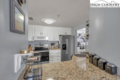 Beautiful Citadel Unit with Grandfather Mountain Views at Sugar on Sugar Mountain Golf Course in North Carolina - for sale on GolfHomes.com, golf home, golf lot