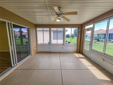 Welcome to this charming Challedon model home, nestled in the on Eagle Ridge At Spruce Creek Country Club in Florida - for sale on GolfHomes.com, golf home, golf lot