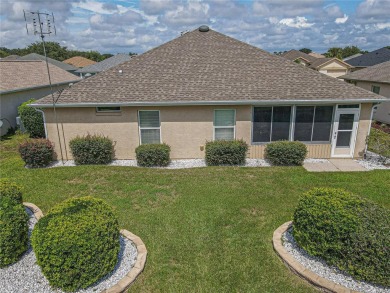 Welcome to this charming Challedon model home, nestled in the on Eagle Ridge At Spruce Creek Country Club in Florida - for sale on GolfHomes.com, golf home, golf lot