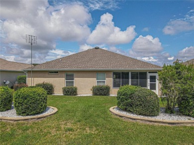 Welcome to this charming Challedon model home, nestled in the on Eagle Ridge At Spruce Creek Country Club in Florida - for sale on GolfHomes.com, golf home, golf lot