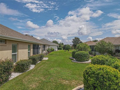 Welcome to this charming Challedon model home, nestled in the on Eagle Ridge At Spruce Creek Country Club in Florida - for sale on GolfHomes.com, golf home, golf lot