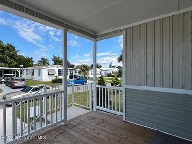 Experience modern Florida living in this stunning new on Barefoot Bay Golf Course in Florida - for sale on GolfHomes.com, golf home, golf lot