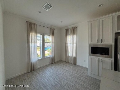 Experience modern Florida living in this stunning new on Barefoot Bay Golf Course in Florida - for sale on GolfHomes.com, golf home, golf lot