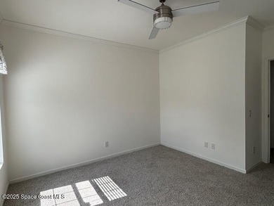 Experience modern Florida living in this stunning new on Barefoot Bay Golf Course in Florida - for sale on GolfHomes.com, golf home, golf lot