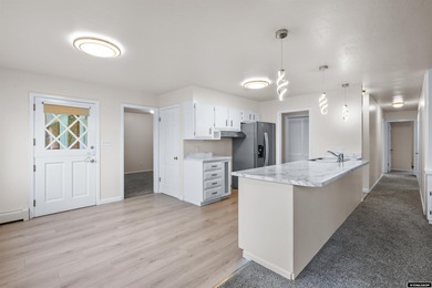 Custom built all-brick ranch home located on the Paradise Valley on Paradise Valley Country Club in Wyoming - for sale on GolfHomes.com, golf home, golf lot