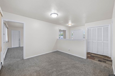 Custom built all-brick ranch home located on the Paradise Valley on Paradise Valley Country Club in Wyoming - for sale on GolfHomes.com, golf home, golf lot