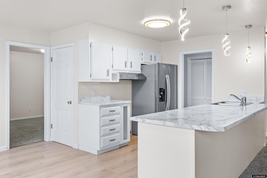 Custom built all-brick ranch home located on the Paradise Valley on Paradise Valley Country Club in Wyoming - for sale on GolfHomes.com, golf home, golf lot