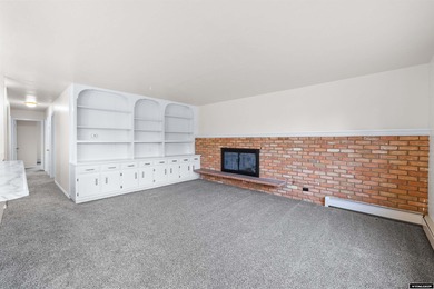 Custom built all-brick ranch home located on the Paradise Valley on Paradise Valley Country Club in Wyoming - for sale on GolfHomes.com, golf home, golf lot