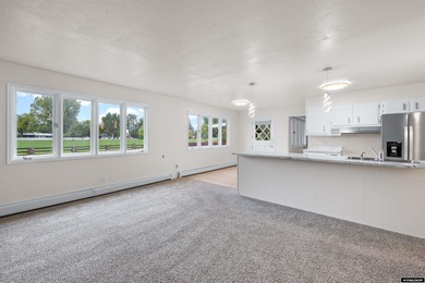 Custom built all-brick ranch home located on the Paradise Valley on Paradise Valley Country Club in Wyoming - for sale on GolfHomes.com, golf home, golf lot