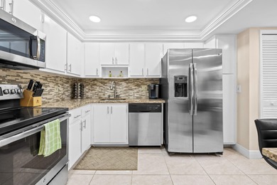 Discover your slice of paradise in this beautiful 2BR/2BA Palm on Palm-Aire Country Club and Resort - Palms in Florida - for sale on GolfHomes.com, golf home, golf lot