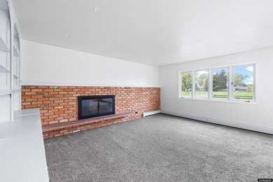 Custom built all-brick ranch home located on the Paradise Valley on Paradise Valley Country Club in Wyoming - for sale on GolfHomes.com, golf home, golf lot