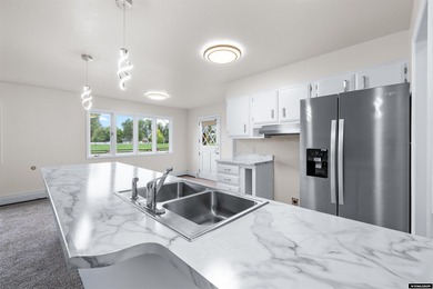 Custom built all-brick ranch home located on the Paradise Valley on Paradise Valley Country Club in Wyoming - for sale on GolfHomes.com, golf home, golf lot