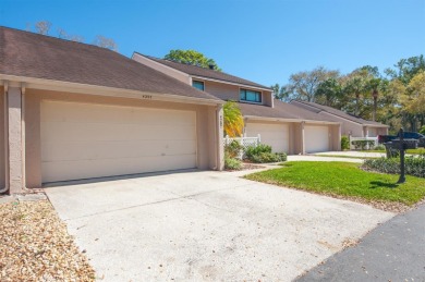 PRICE IMPROVEMENT! WELCOME HOME TO 4207 HARTWOOD LANE LOCATED IN on Carrollwood Country Club in Florida - for sale on GolfHomes.com, golf home, golf lot