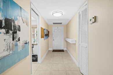 Discover your slice of paradise in this beautiful 2BR/2BA Palm on Palm-Aire Country Club and Resort - Palms in Florida - for sale on GolfHomes.com, golf home, golf lot