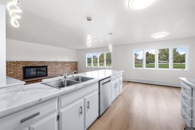 Custom built all-brick ranch home located on the Paradise Valley on Paradise Valley Country Club in Wyoming - for sale on GolfHomes.com, golf home, golf lot