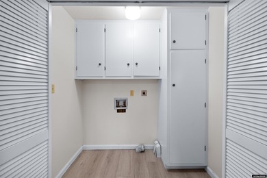 Custom built all-brick ranch home located on the Paradise Valley on Paradise Valley Country Club in Wyoming - for sale on GolfHomes.com, golf home, golf lot