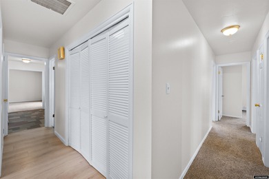 Custom built all-brick ranch home located on the Paradise Valley on Paradise Valley Country Club in Wyoming - for sale on GolfHomes.com, golf home, golf lot