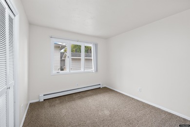 Custom built all-brick ranch home located on the Paradise Valley on Paradise Valley Country Club in Wyoming - for sale on GolfHomes.com, golf home, golf lot