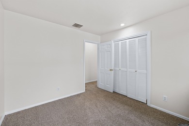 Custom built all-brick ranch home located on the Paradise Valley on Paradise Valley Country Club in Wyoming - for sale on GolfHomes.com, golf home, golf lot