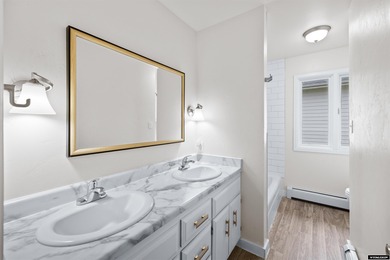 Custom built all-brick ranch home located on the Paradise Valley on Paradise Valley Country Club in Wyoming - for sale on GolfHomes.com, golf home, golf lot