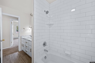 Custom built all-brick ranch home located on the Paradise Valley on Paradise Valley Country Club in Wyoming - for sale on GolfHomes.com, golf home, golf lot