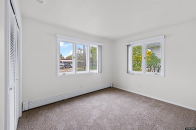 Custom built all-brick ranch home located on the Paradise Valley on Paradise Valley Country Club in Wyoming - for sale on GolfHomes.com, golf home, golf lot