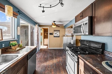 Escape to Small-Town Serenity-Classic & Contemporary in Colorado on Hollydot Golf Course in Colorado - for sale on GolfHomes.com, golf home, golf lot