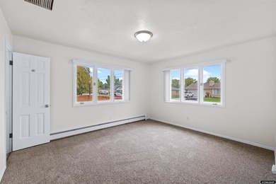 Custom built all-brick ranch home located on the Paradise Valley on Paradise Valley Country Club in Wyoming - for sale on GolfHomes.com, golf home, golf lot