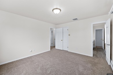 Custom built all-brick ranch home located on the Paradise Valley on Paradise Valley Country Club in Wyoming - for sale on GolfHomes.com, golf home, golf lot