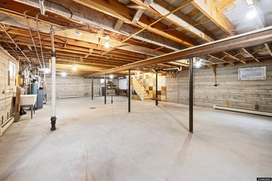 Custom built all-brick ranch home located on the Paradise Valley on Paradise Valley Country Club in Wyoming - for sale on GolfHomes.com, golf home, golf lot