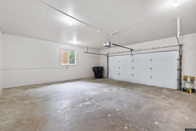 Custom built all-brick ranch home located on the Paradise Valley on Paradise Valley Country Club in Wyoming - for sale on GolfHomes.com, golf home, golf lot