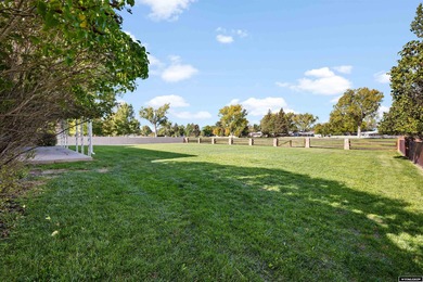 Custom built all-brick ranch home located on the Paradise Valley on Paradise Valley Country Club in Wyoming - for sale on GolfHomes.com, golf home, golf lot