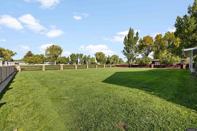 Custom built all-brick ranch home located on the Paradise Valley on Paradise Valley Country Club in Wyoming - for sale on GolfHomes.com, golf home, golf lot