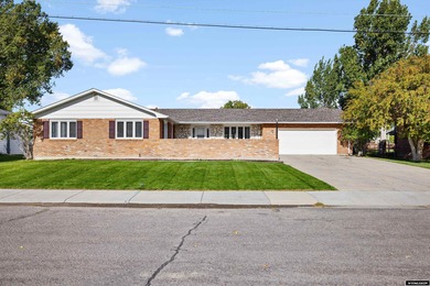 Custom built all-brick ranch home located on the Paradise Valley on Paradise Valley Country Club in Wyoming - for sale on GolfHomes.com, golf home, golf lot