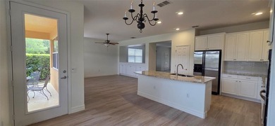 Exceptional residence in the prestigious gated community of on Eagle Creek Golf Club in Florida - for sale on GolfHomes.com, golf home, golf lot